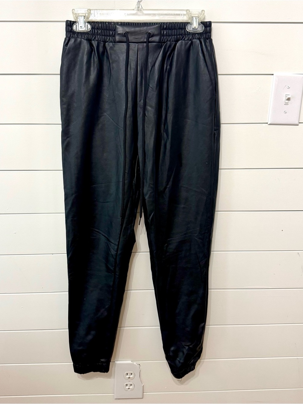 black faux leather jogger pants